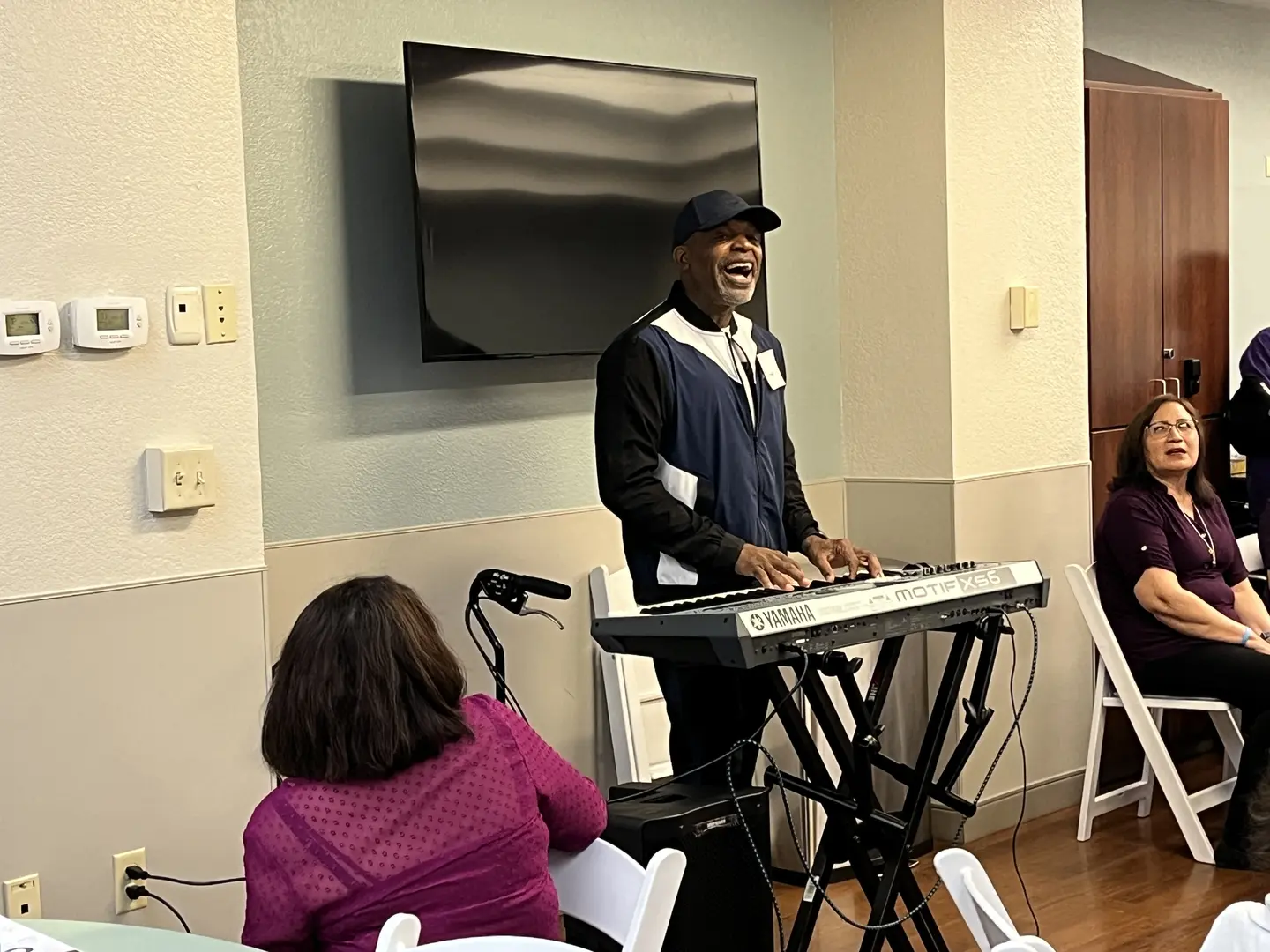 Jerome Roberson playing a keyboard.