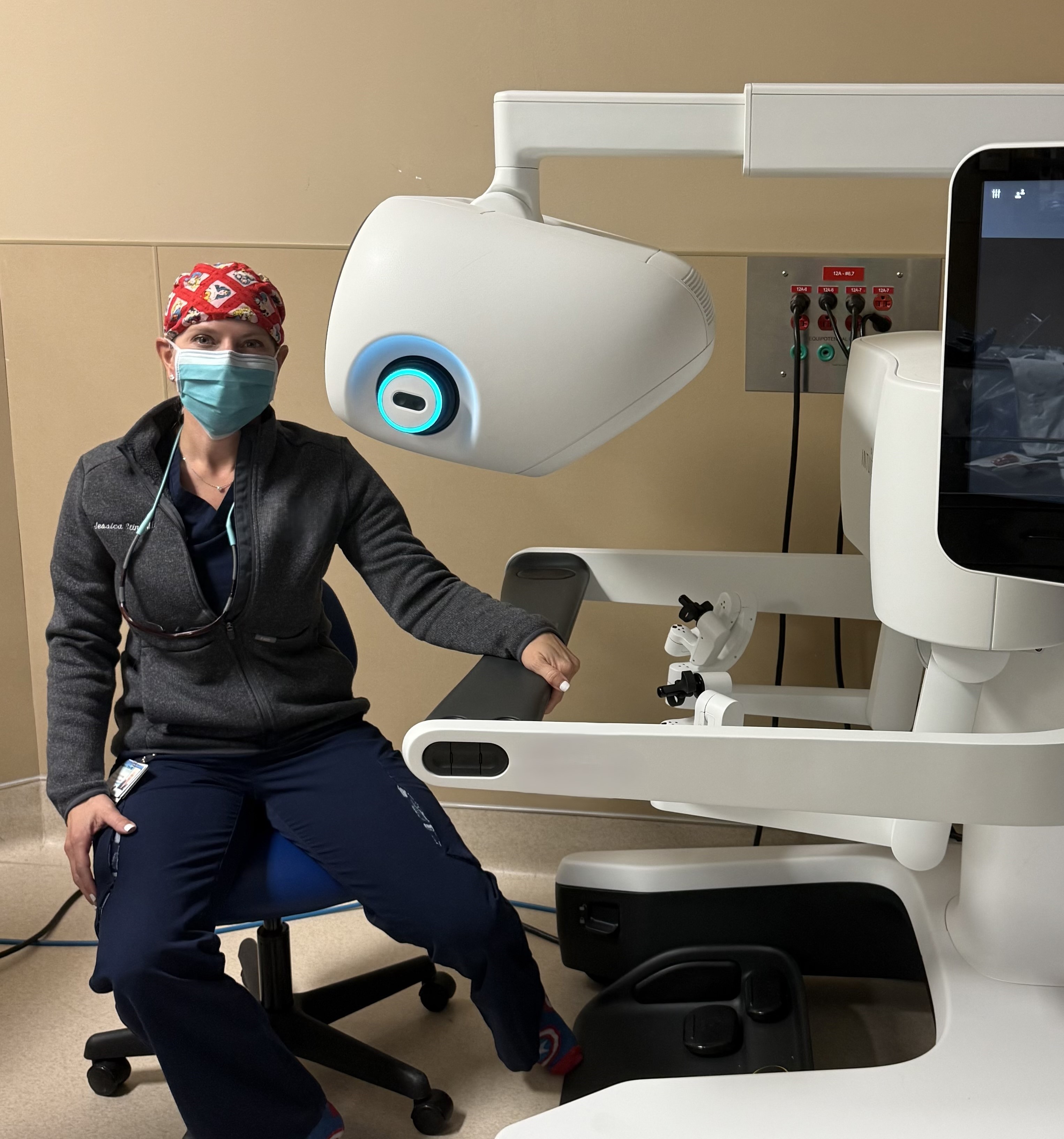 Dr. Jessica Stine, Gynecologic Oncologist, prepares to perform the first procedure with HCA Florida Trinity Hospital's newest surgical robot.