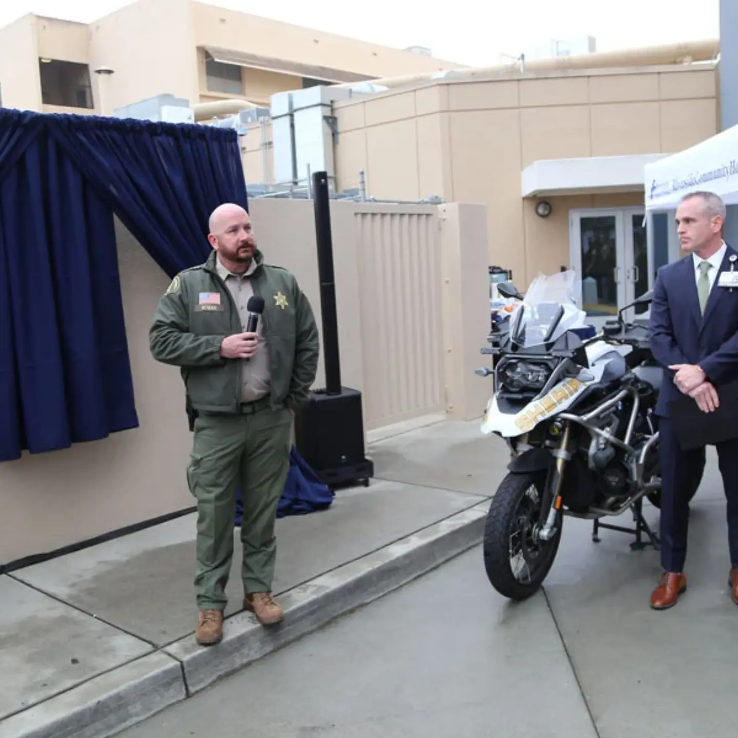 Sheriff Captain Justin Rowan speaks during a dedication ceremony honoring Deputy Timothy Corlew.