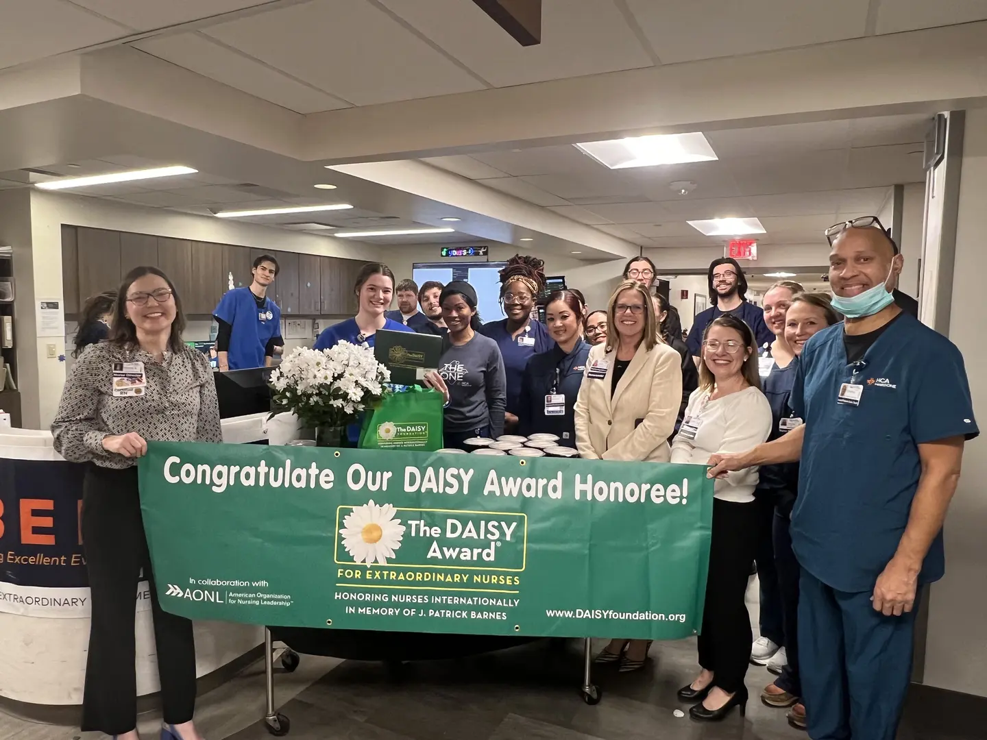 Cameron Nettles and the provider team celebrating the DAISY award.