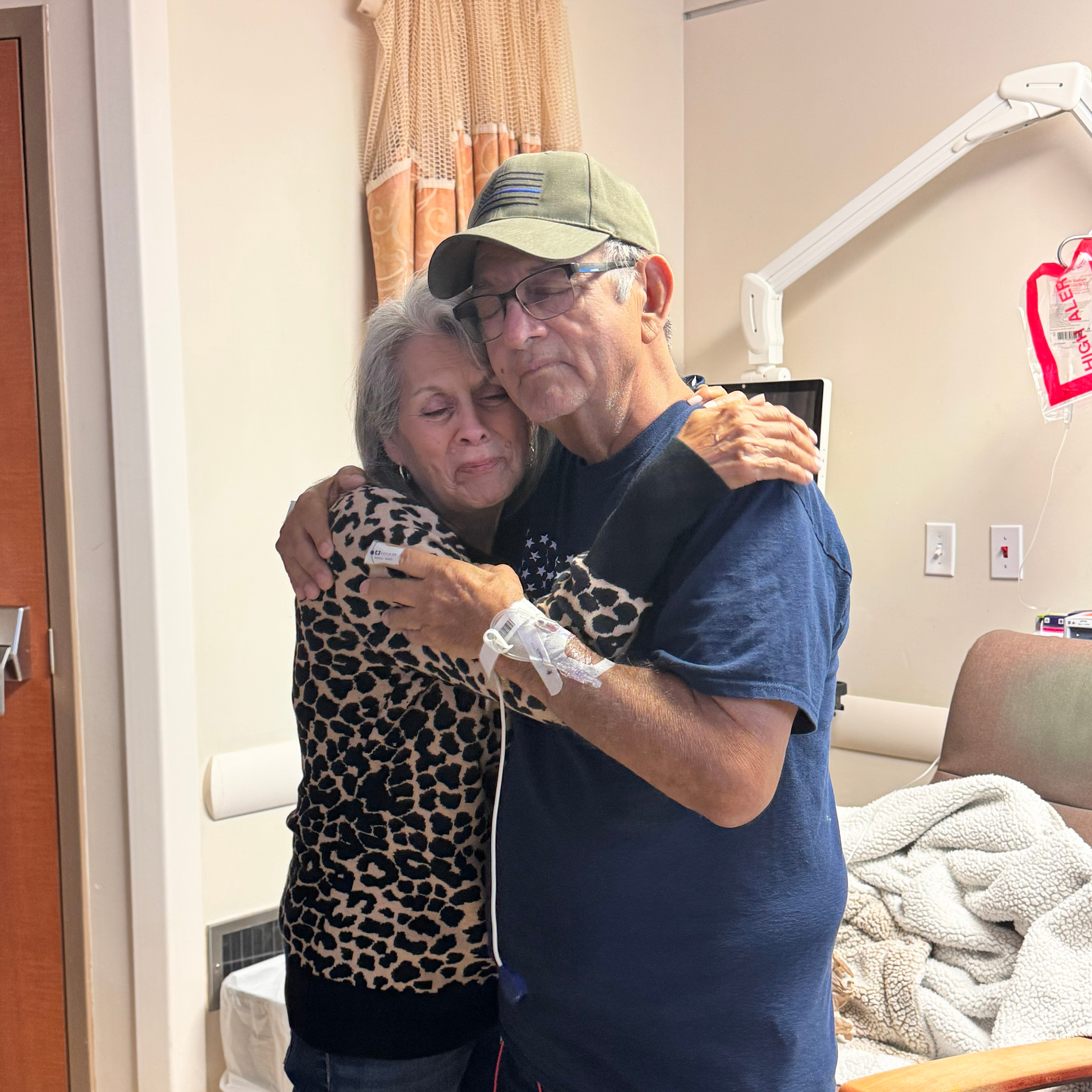 Trini and Lupe embrace during dance