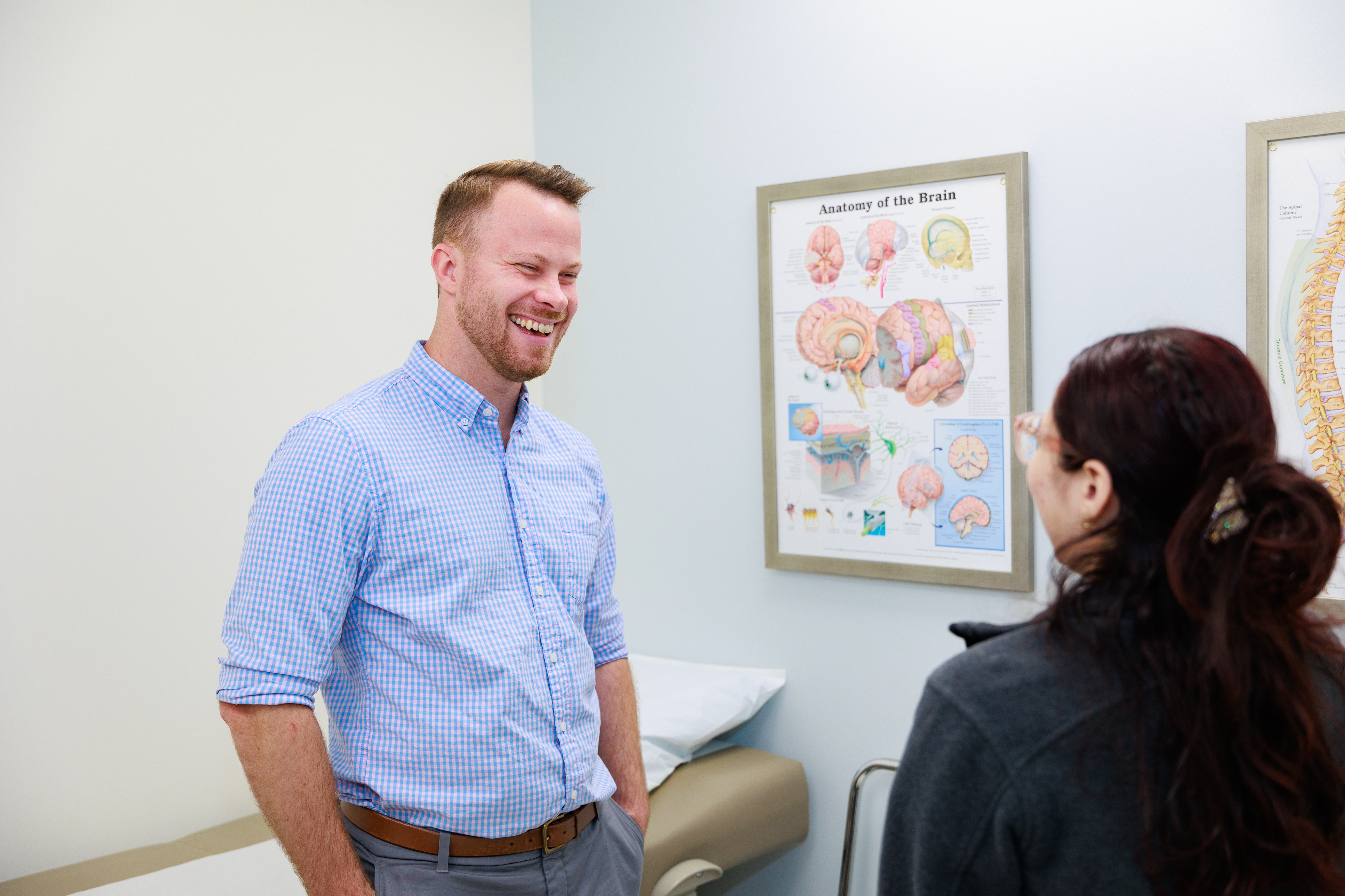 Pictured is Dr. Dennis Cole talking with a patient in his neurology clinic at TriStar Skyline Medical Center.