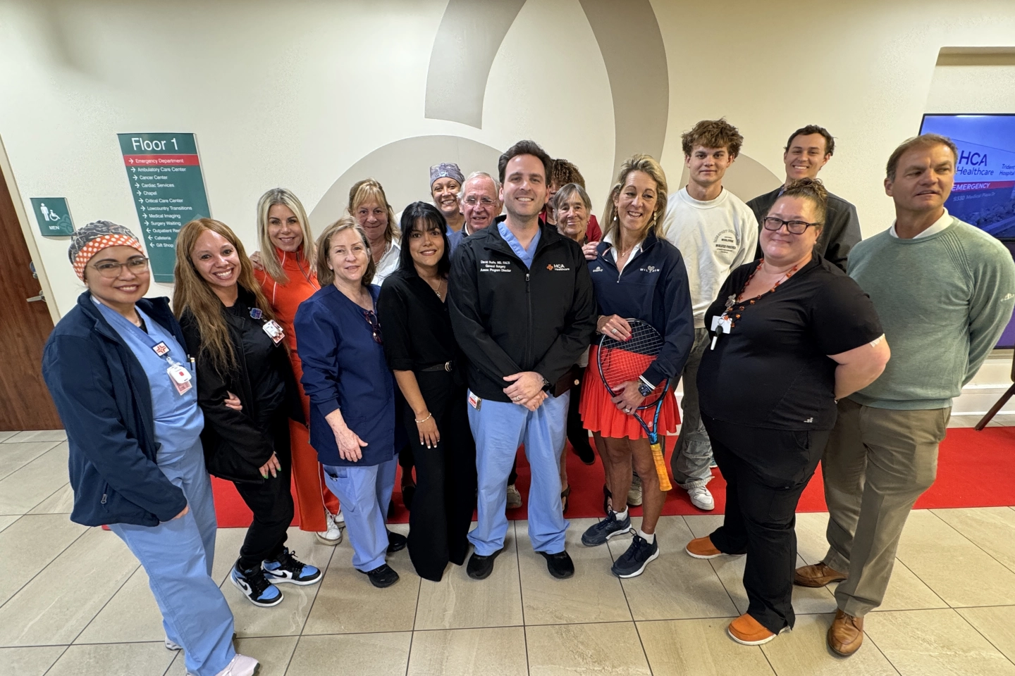 Erin Grimm with members of the surgical and nursing teams who cared for her.