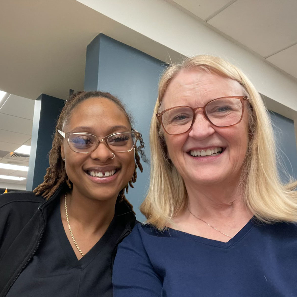 Shayla Fields stands with Jill Nix, the NICU nurse who cared for her as a baby.