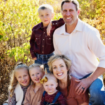Michaela pictured with her family outdoors