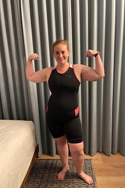 Mackenzie Mitchell flexing her muscles.