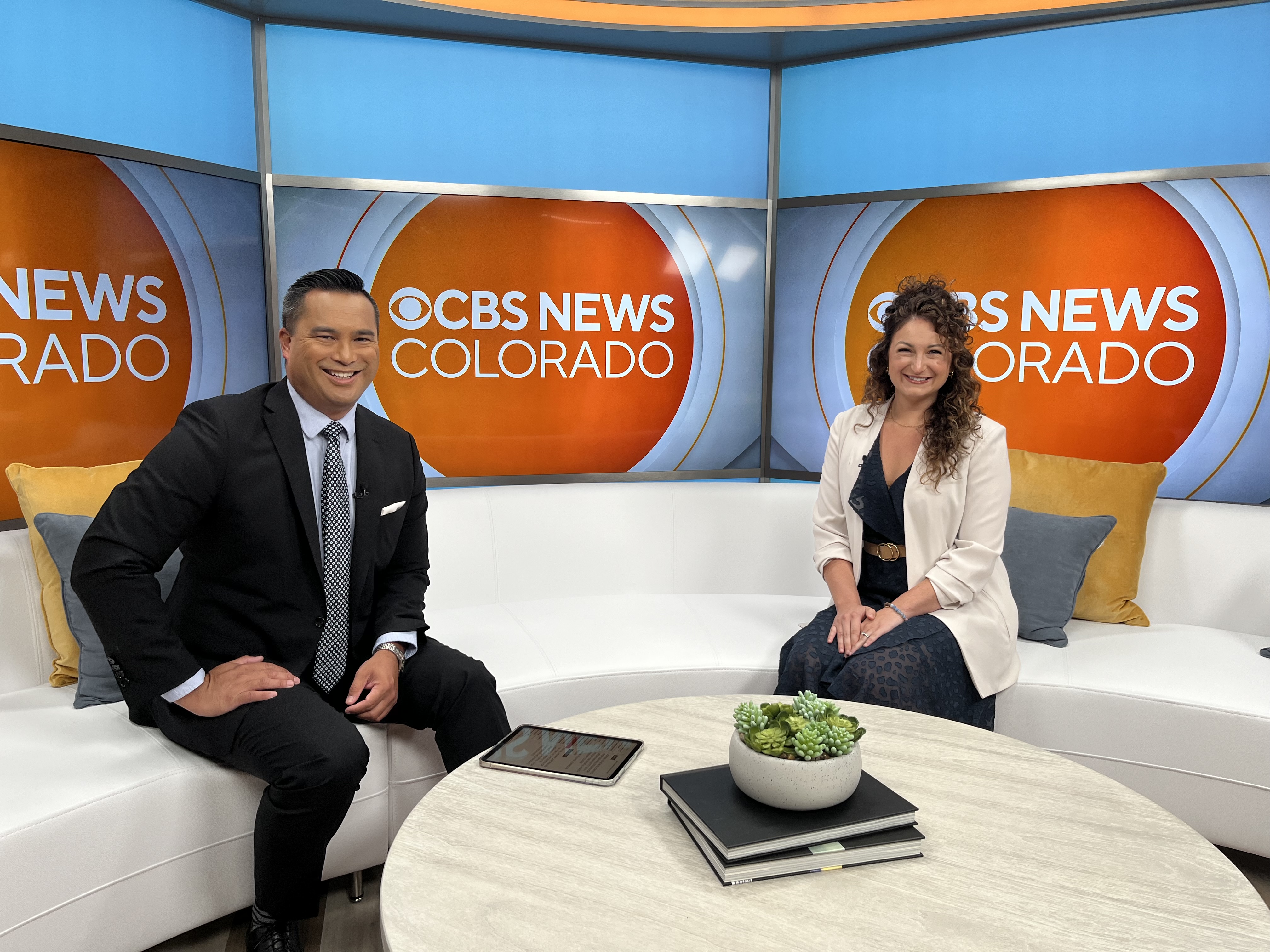 In the newsroom at CBS News Colorado with Megan Marchetti