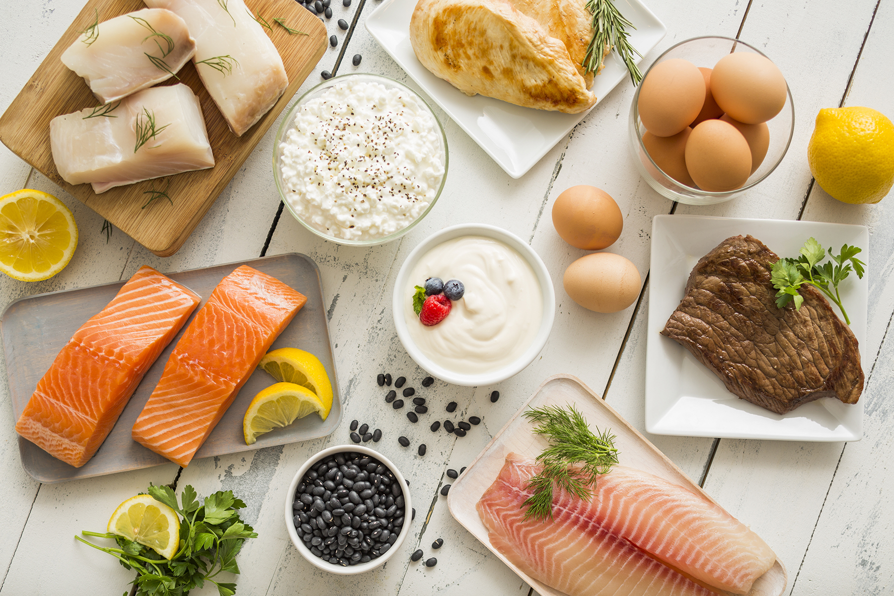 An array of healthy food items grouped on a table