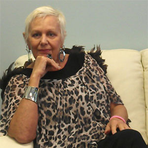 Gale Brill wearing a leopard print top.