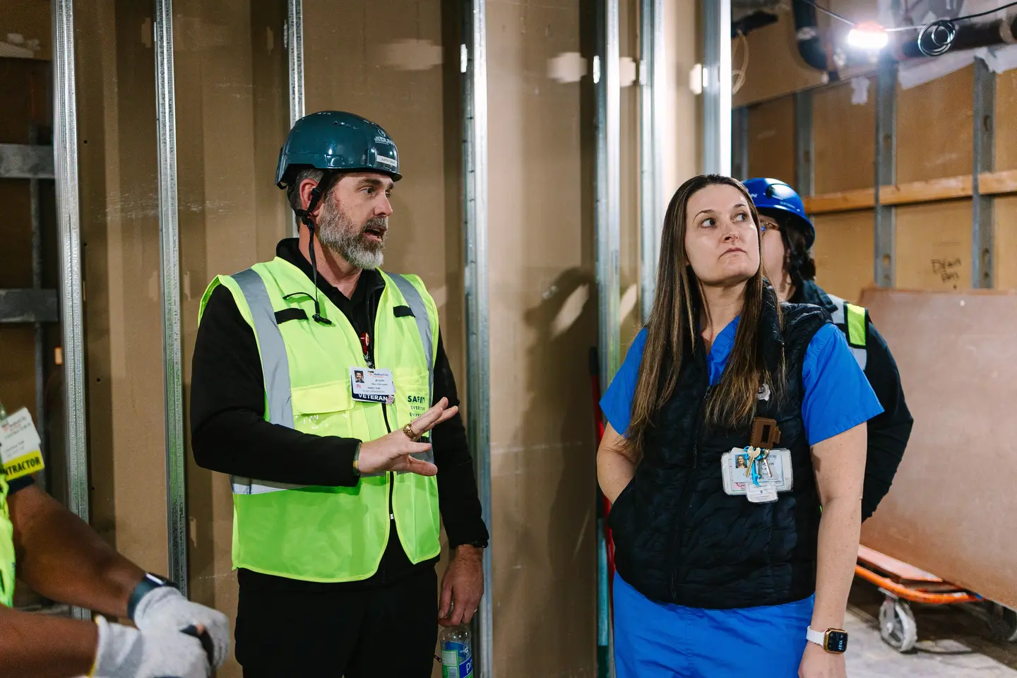 Two team members looking around the construction site.