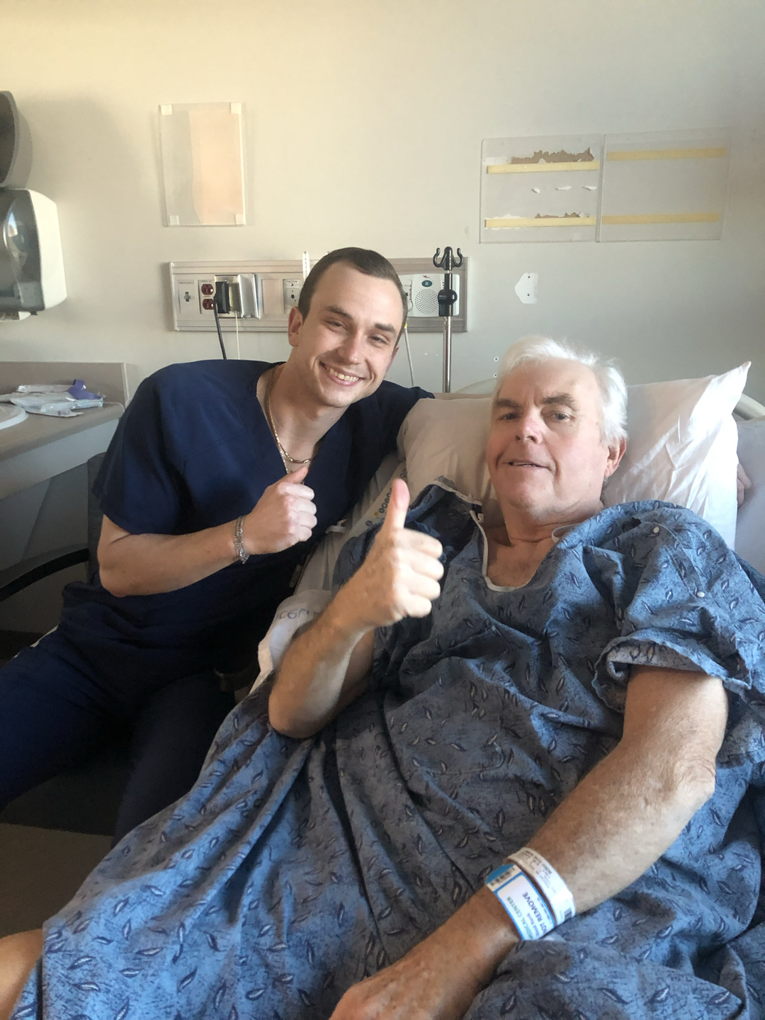 David Johnson and his nurse gives a thumbs up.