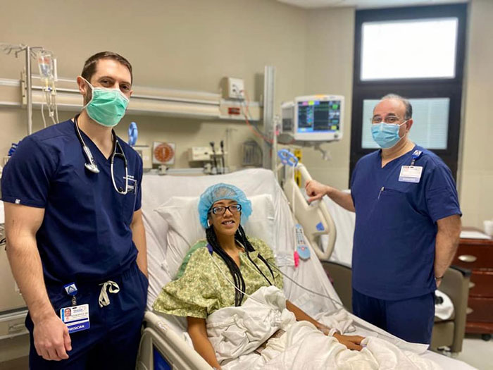 Ashley Curtis with Dr. Kevin Ergle and Dr. Robert Fariva