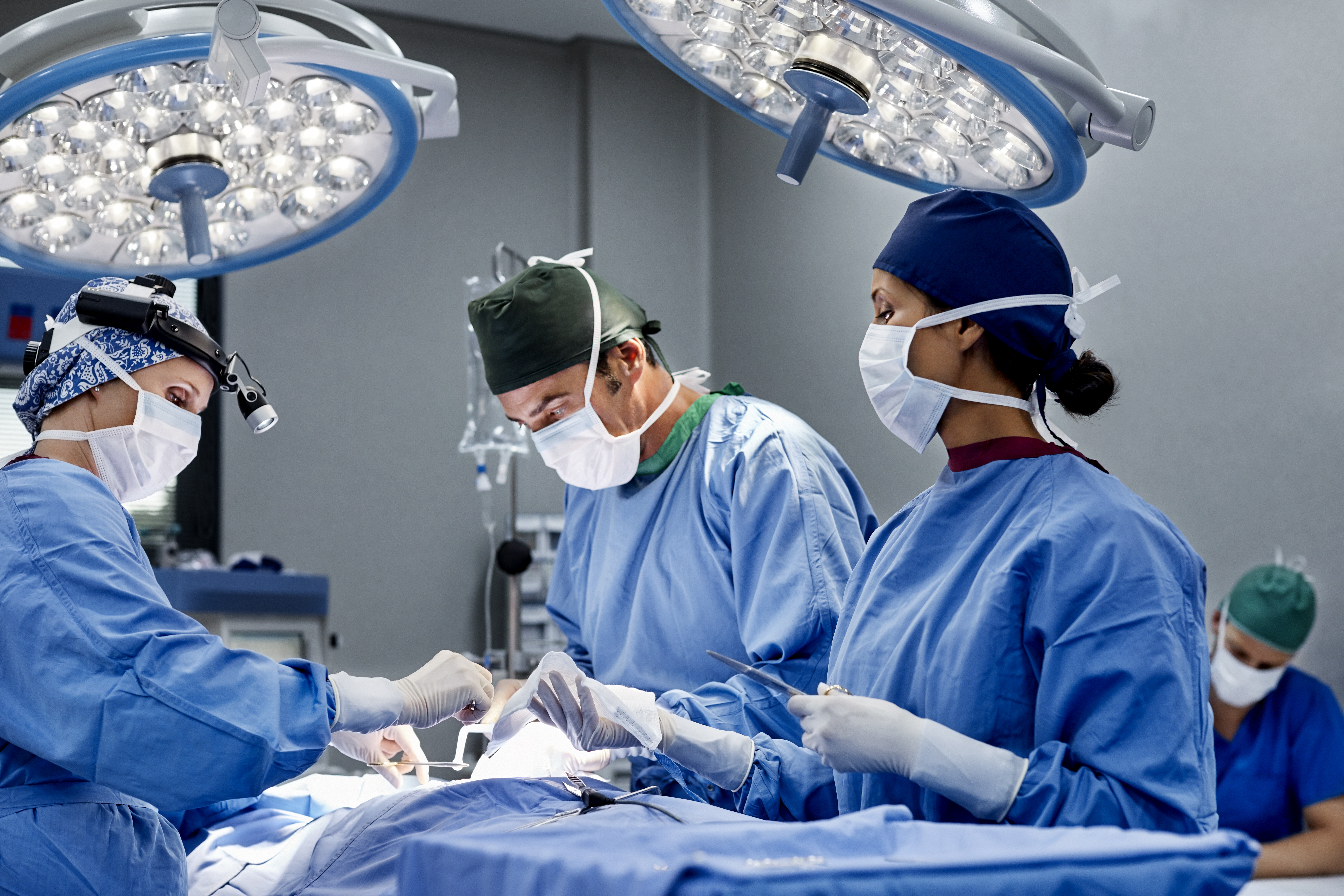 Surgeons performing surgery.
