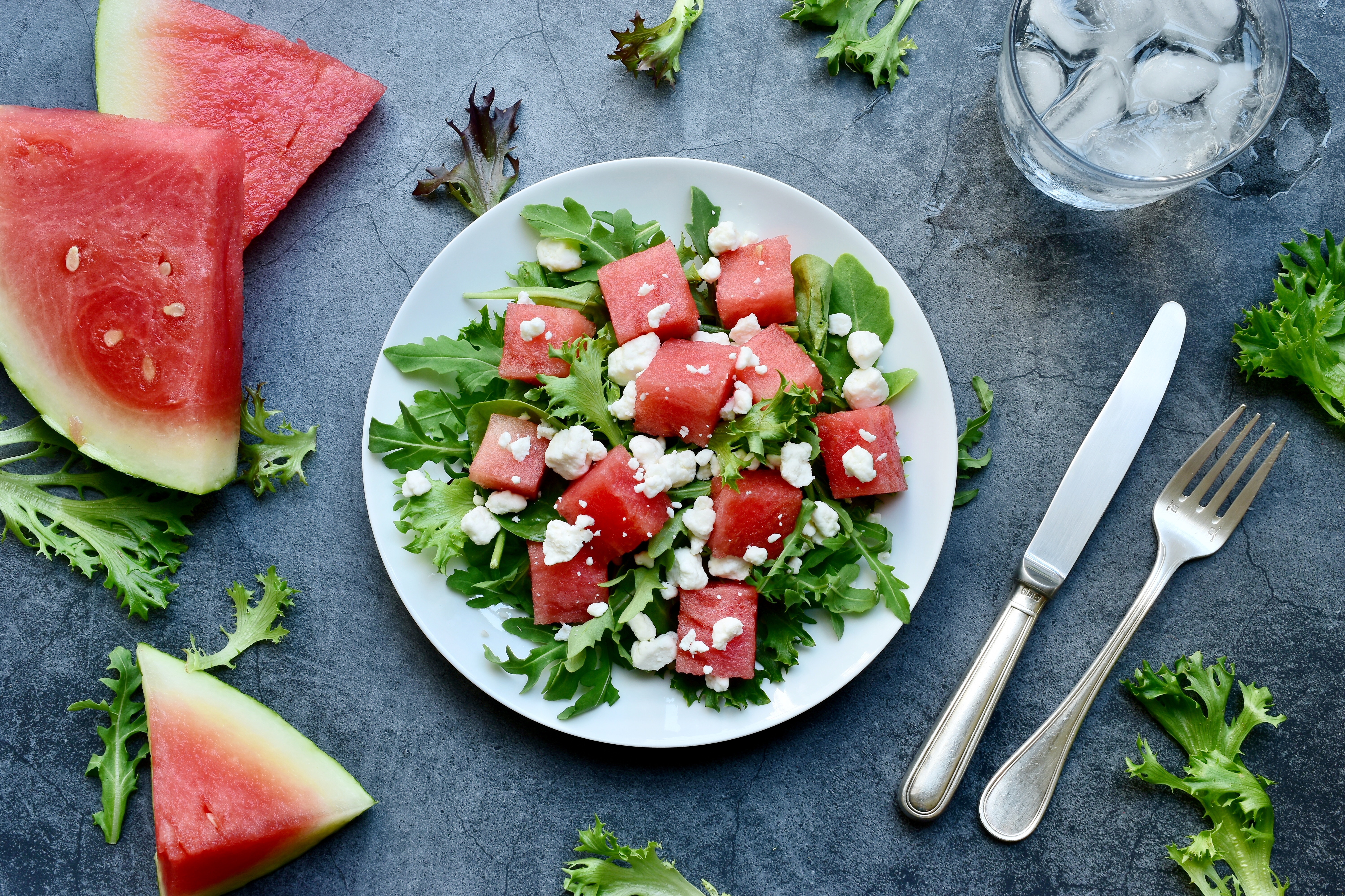 A plate of salad and other greens