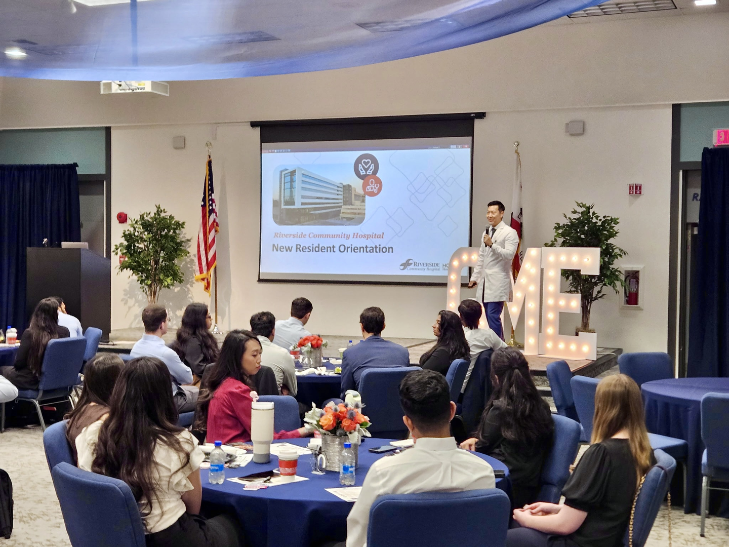 Photo showing of group of people during the welcoming ceremony at Riverside Community Hospital, being welcomed by Dr. Jason An.
