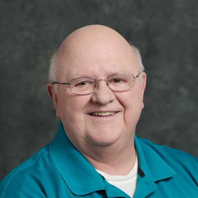 Mike smiling after successful knee replacement surgery at West Valley Medical Center.