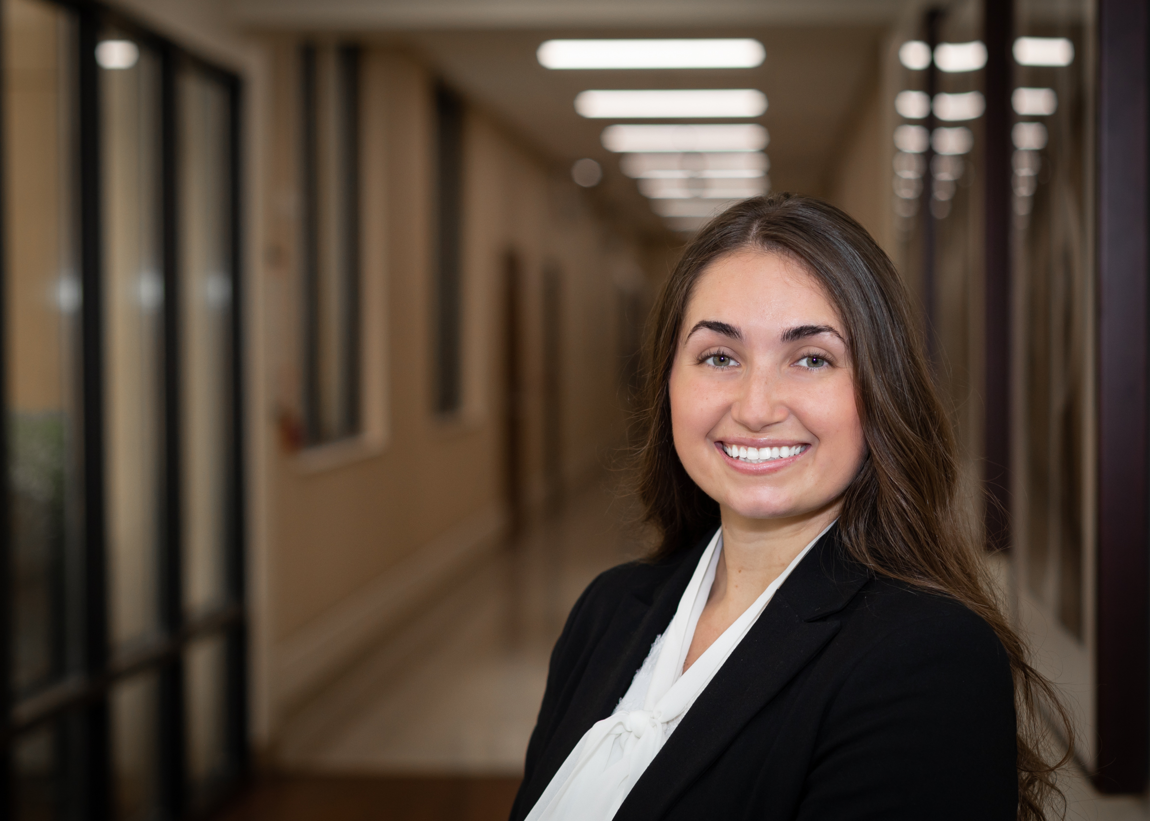 Photo of Olivia Velasquez smiling.