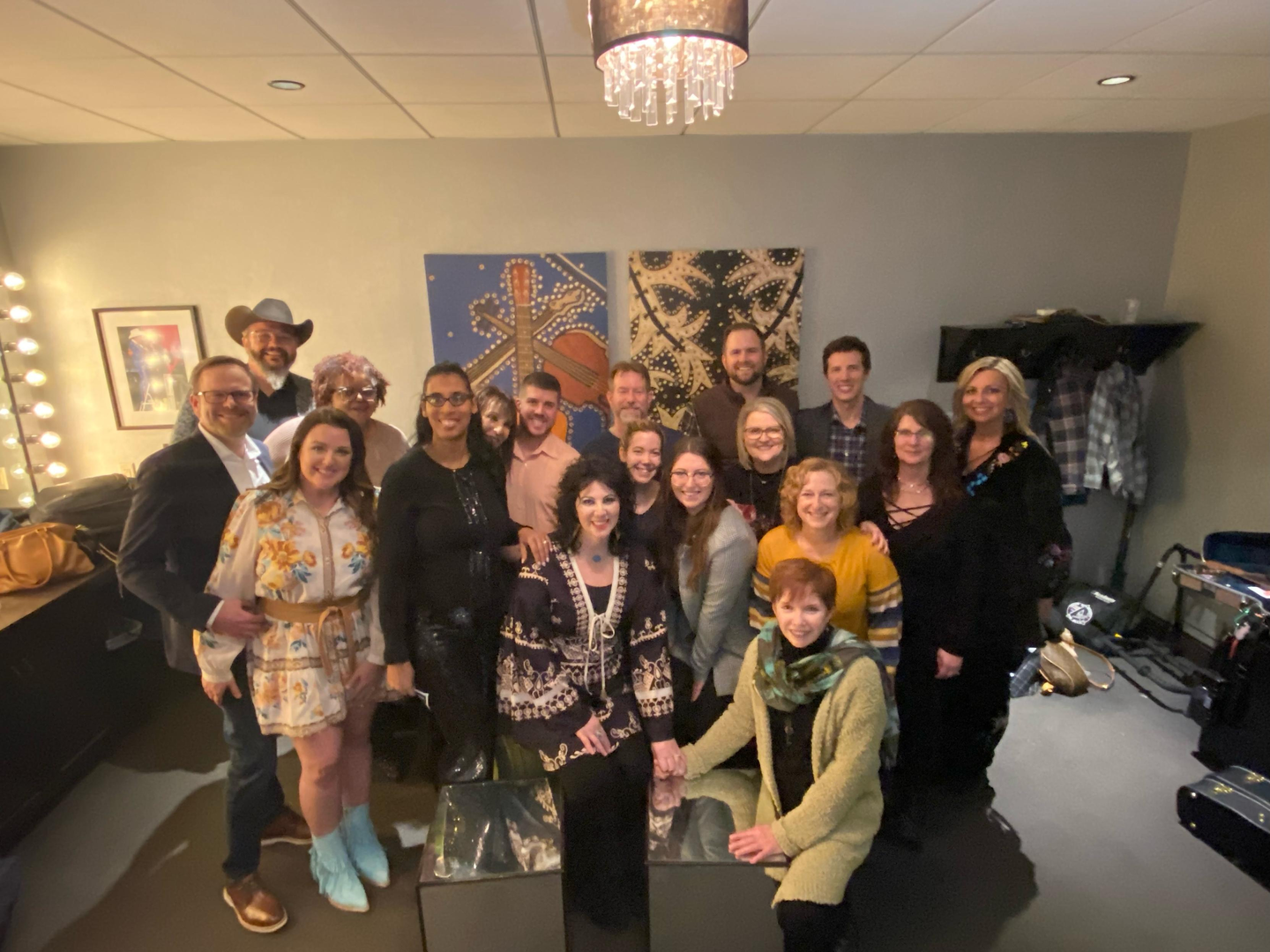 Rehabilitation therapy staff and physicians and providers who cared for Isaccs during her stay at TriStar Skyline. They are backstage at the Grand Ole Opry.