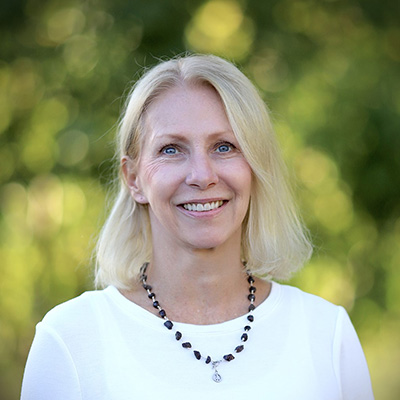 Rhonda Olson smiles for the camera.