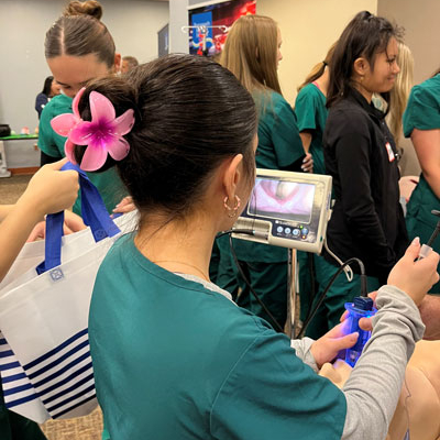 Local high school students engage with medical professionals at the Health Career Expo hosted by Portsmouth Regional Hospital.