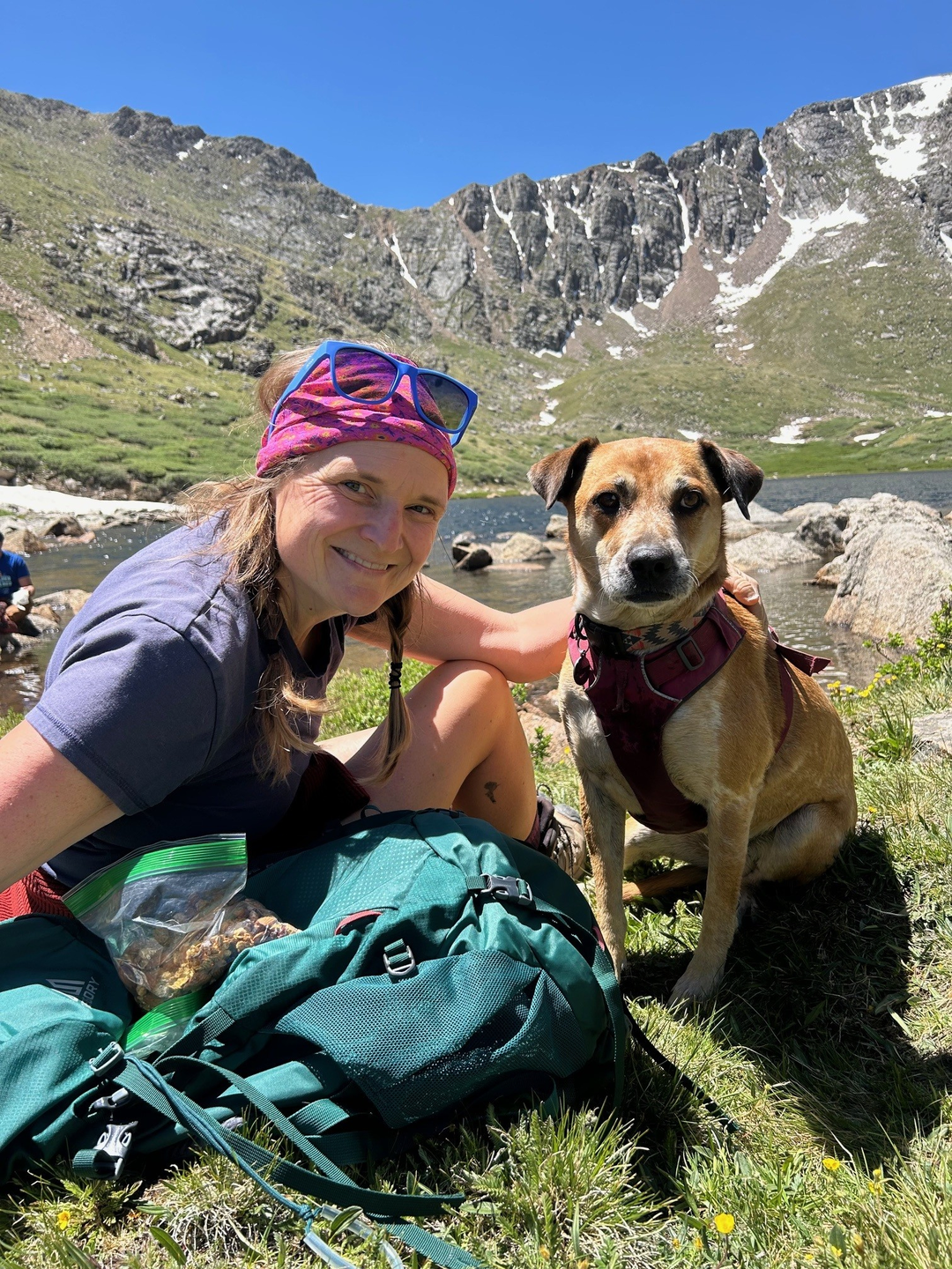 Anne Herbst with her dog outside.