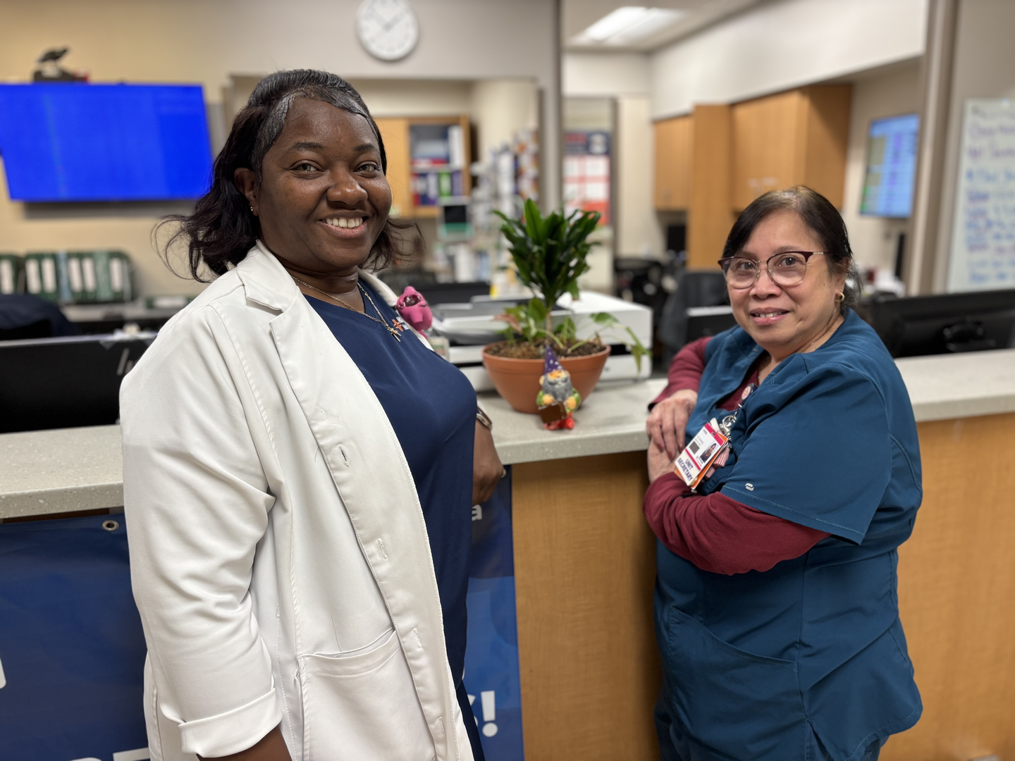 Annie Belle and Irmina from Med Surg Team in Port St Lucie Hospital, smiling for a picture.