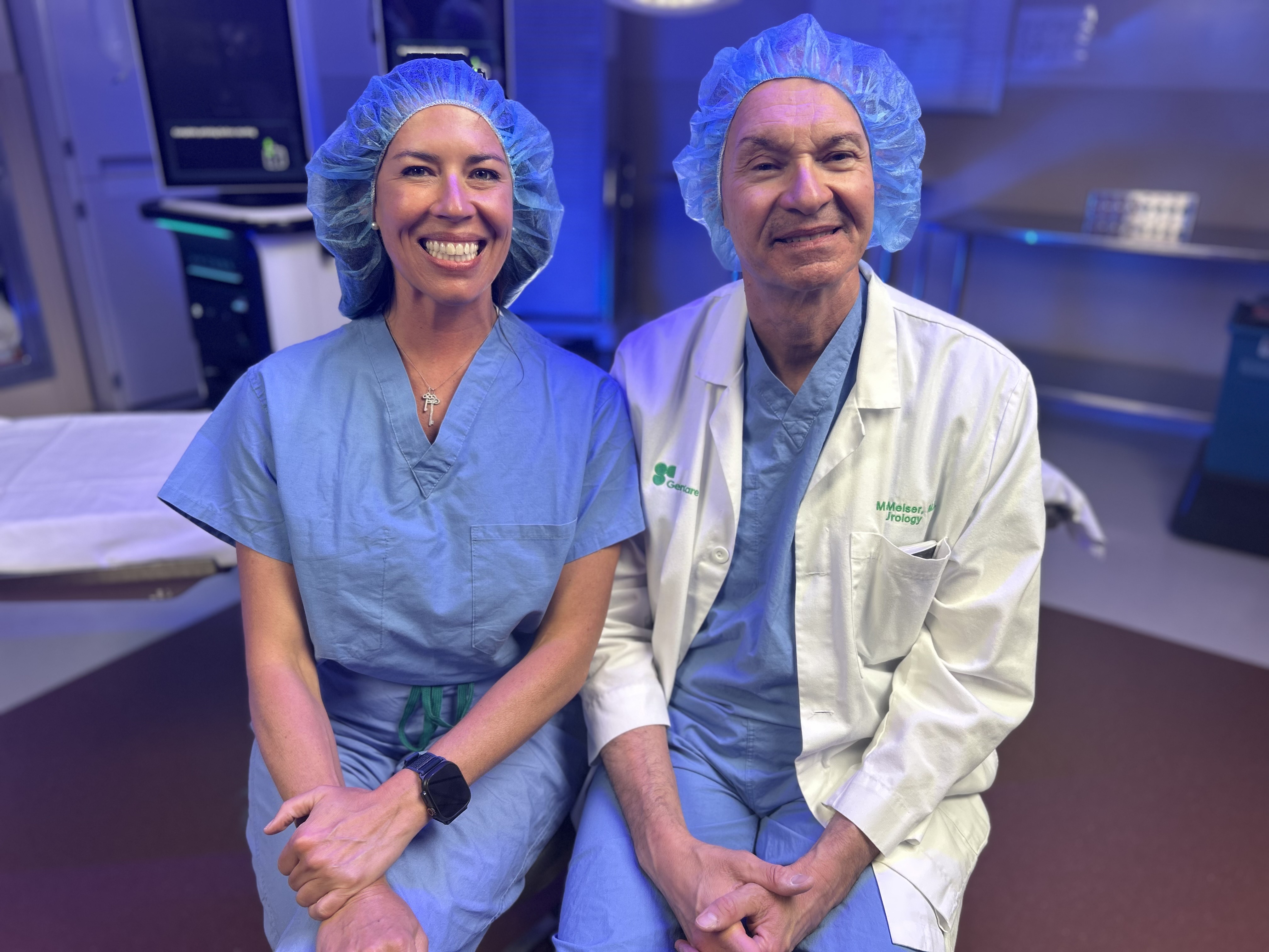 Melissa Wahlburg, registered nurse and Dr. Marc Melser, urologist, prepare for filming of men’s health forum. 