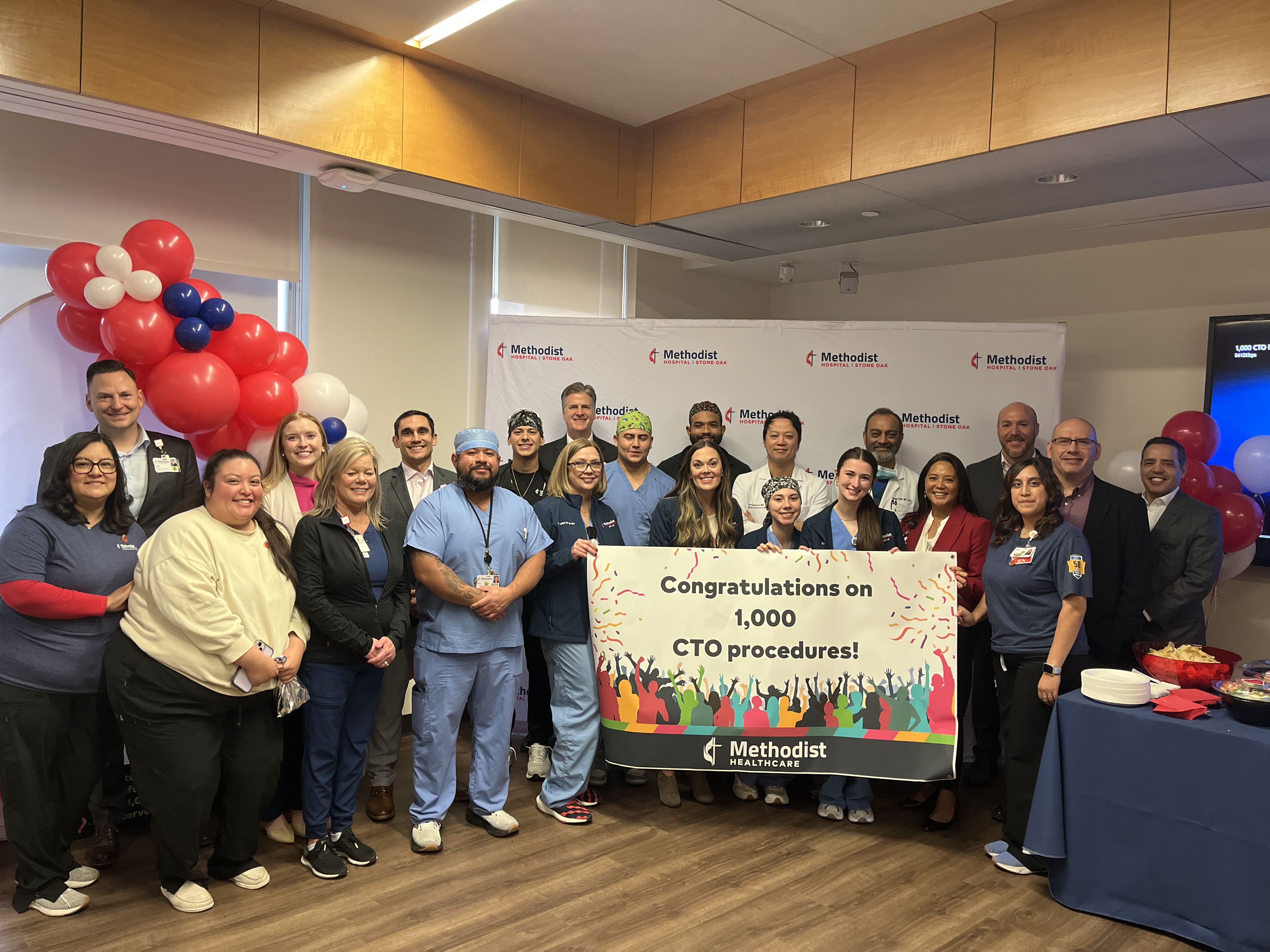The Stone Oak team celebrating 1,000 successful CTO procedures