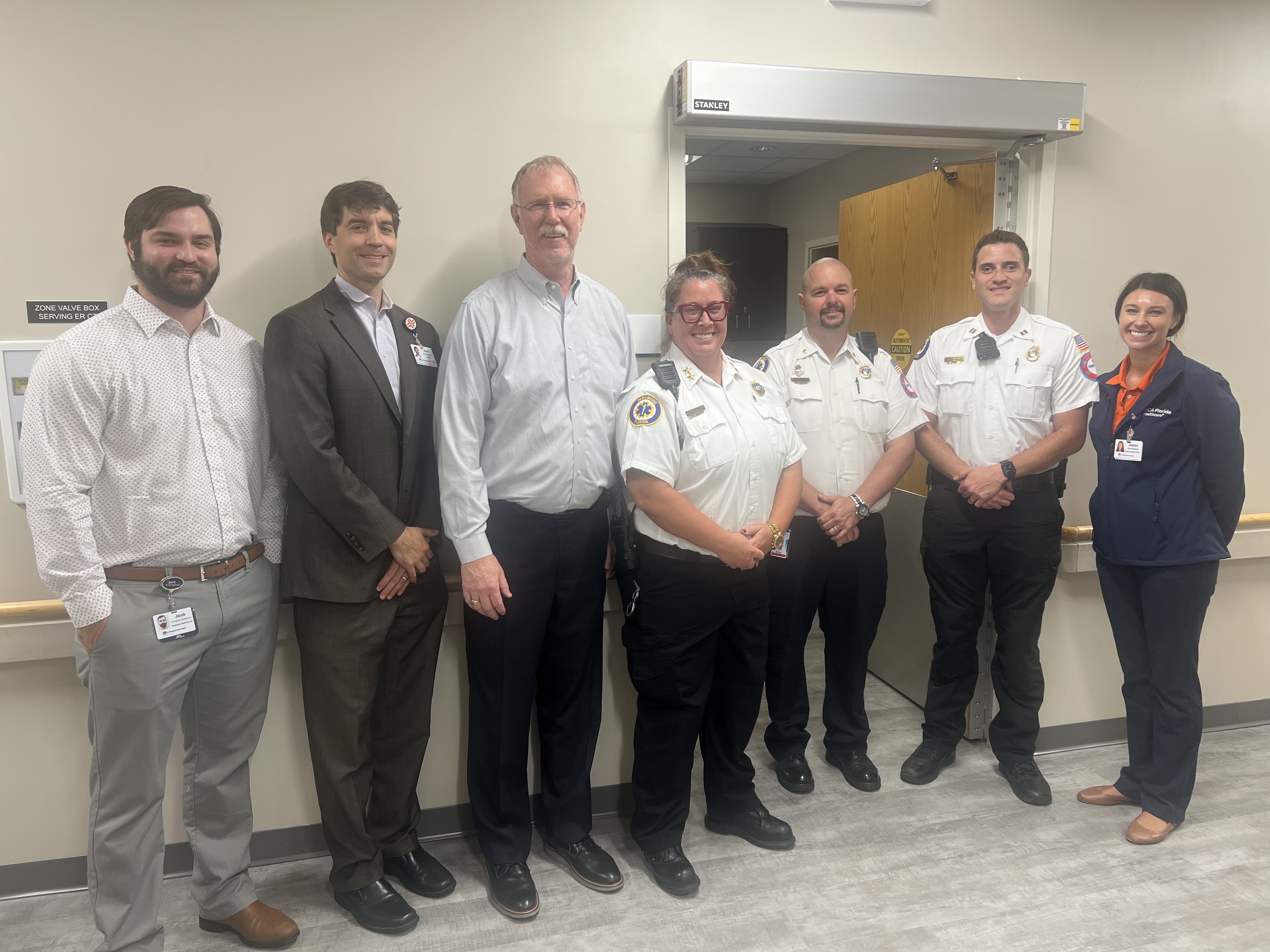 Hospital staff standing together at the ceremony