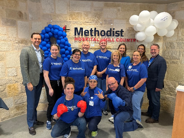 Staff members dressed in blue to observe Colon Cancer Awareness month