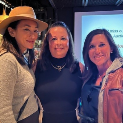 Dr. Karen Lo, Heather Masters and Dr. Kayla Griffith together at an event.