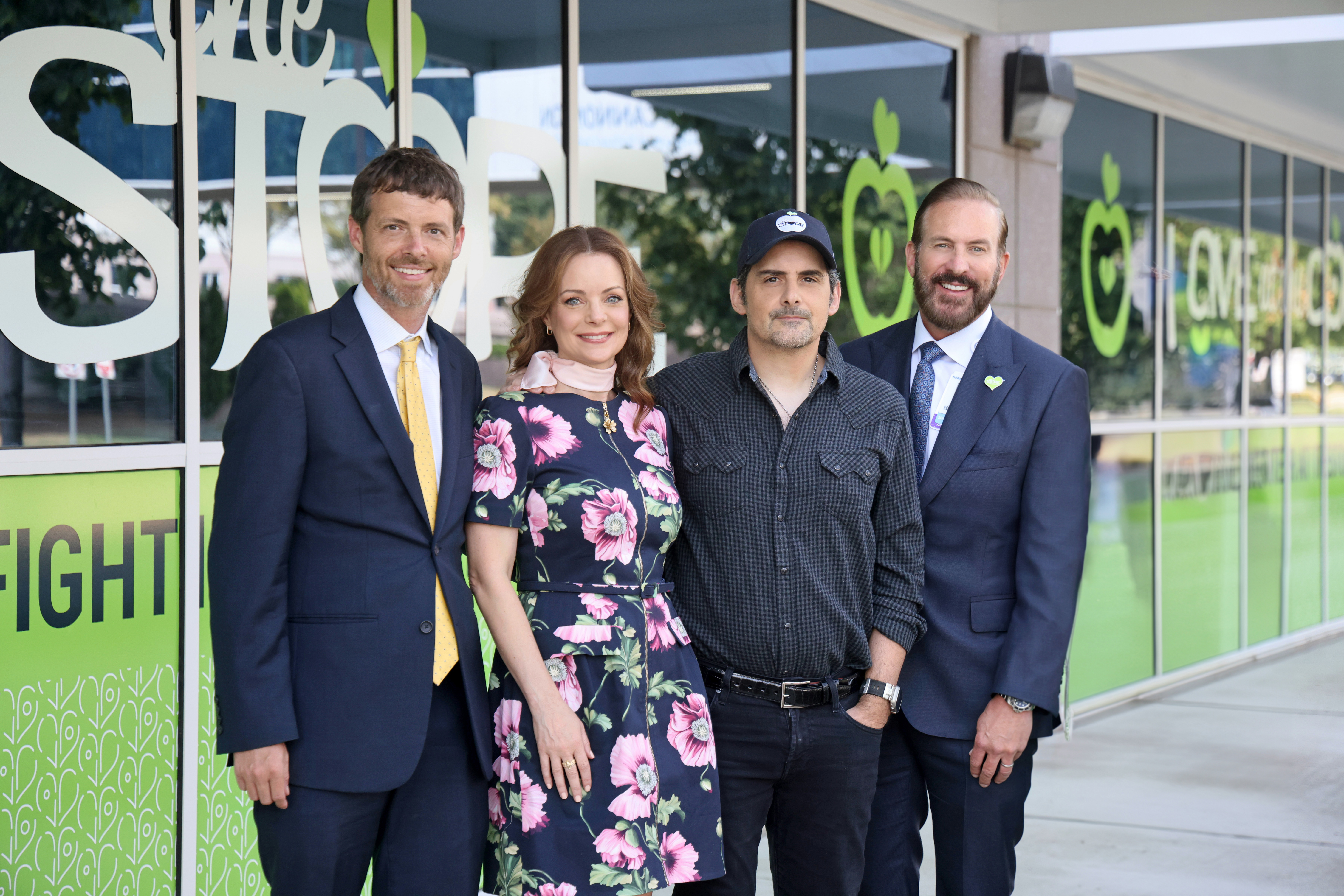 Photo opportunity with Brad and Kimberly Paisley and others outside of The Store.