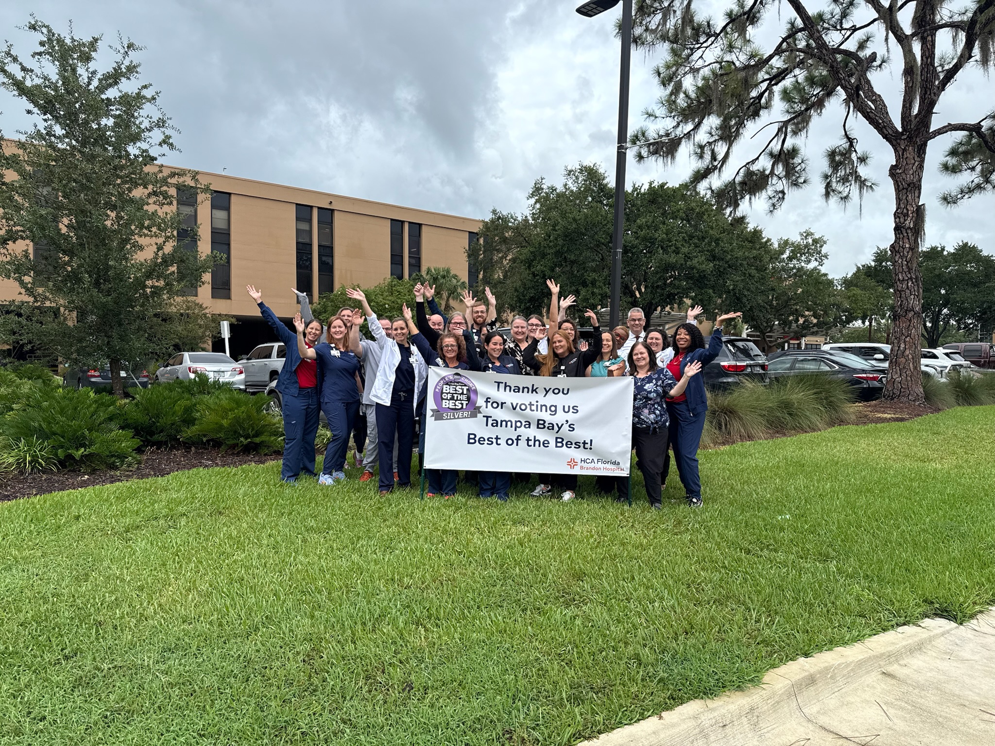 HCA Florida Brandon Hospital's colleagues hold a banner thanking everyone for their vote.