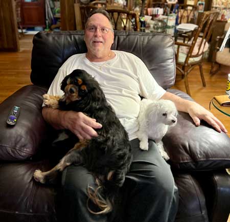 Bob Cole, with his dogs Cooper and Sarah.