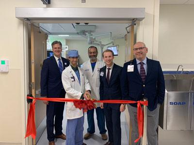 STone Oak hospital staff and executives conduct ribbon cutting ceremony to celebrate hospital facility expansion.