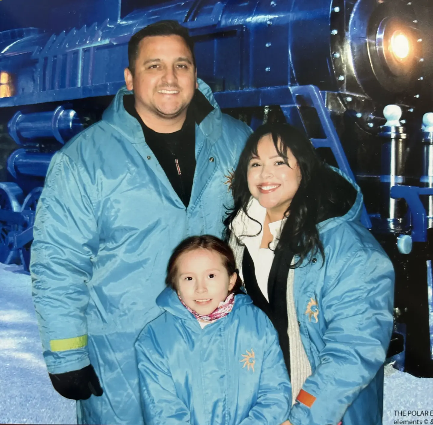 The Garcia family pose at a holiday event.