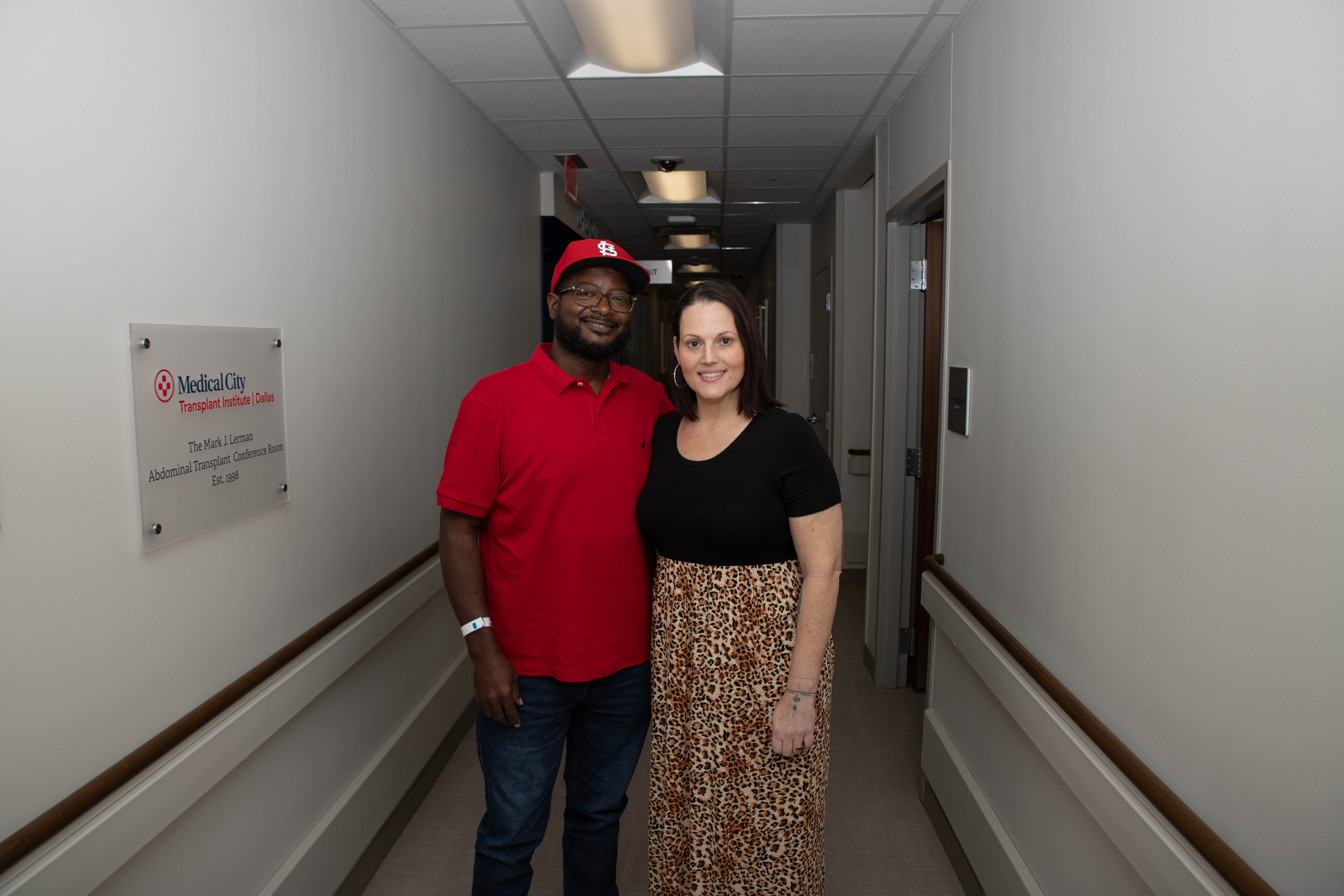 Jereme and Angelina standing in a hallway