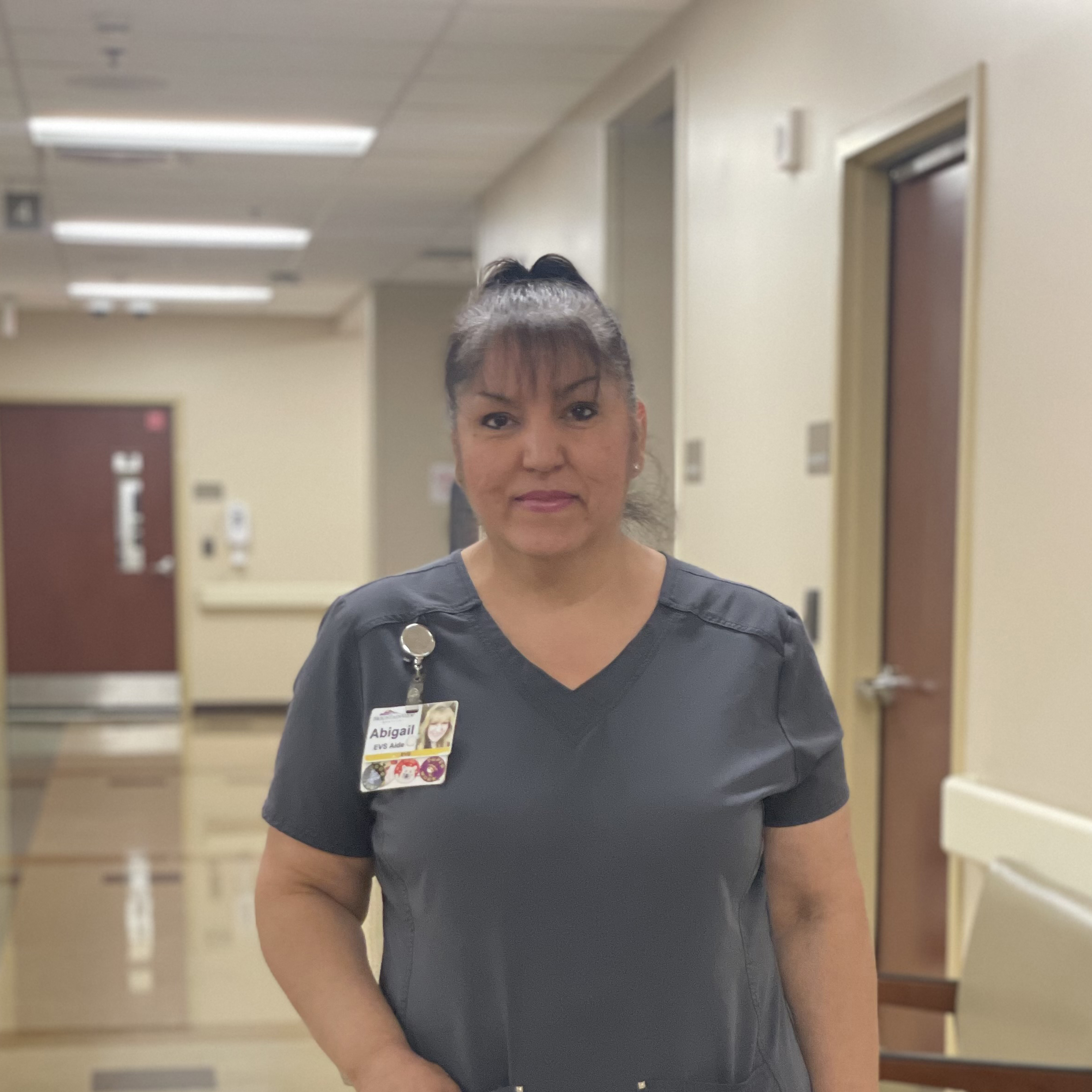 Emergency Room team member, Abigail, in hospital hallway.
