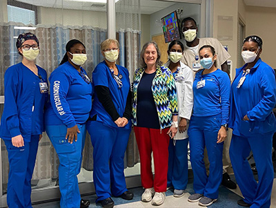Freda Glatt with nurses.