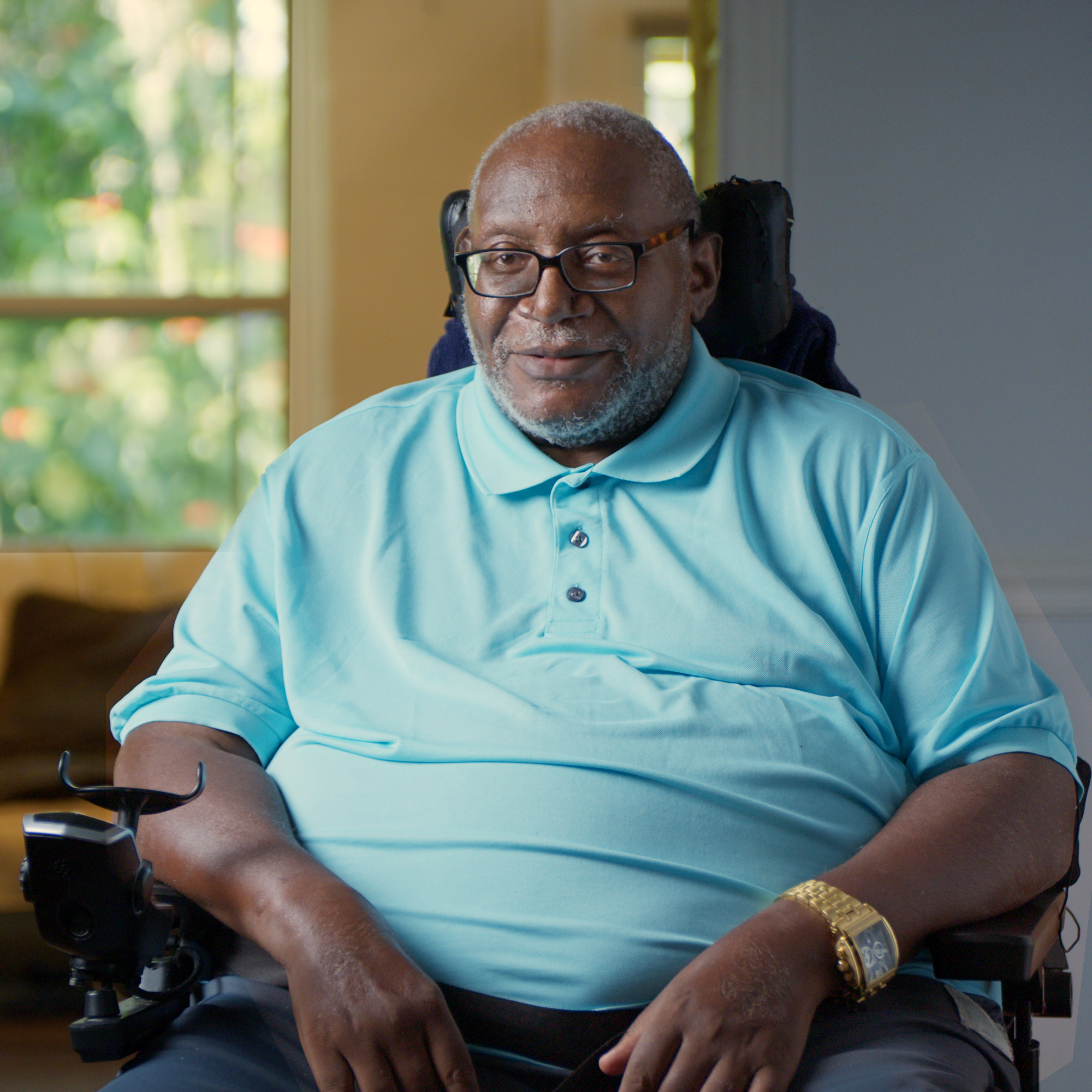 Andre Buford sitting in a wheelchair.