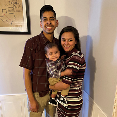 Malachi and his parents.