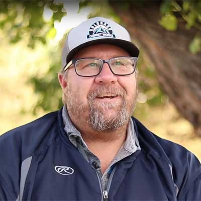 Trevor Tate in a hat and glasses.