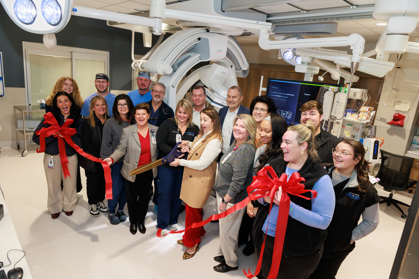 Pictured are leadership and colleagues at TriStar Skyline Medical Center reacting to the ribbon being cut.