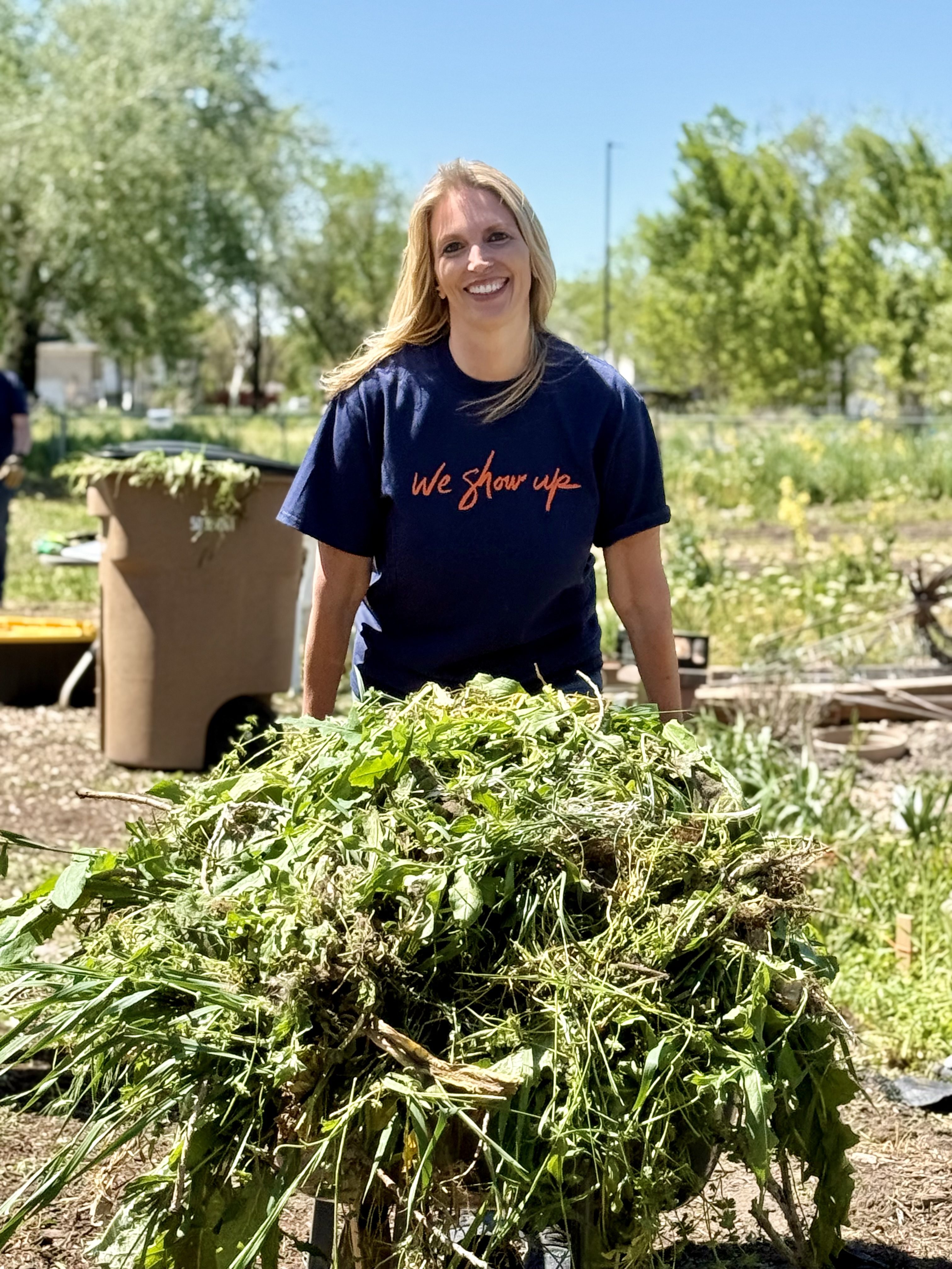 Photo of HCA Mountain Division Colleague working in the garden.
