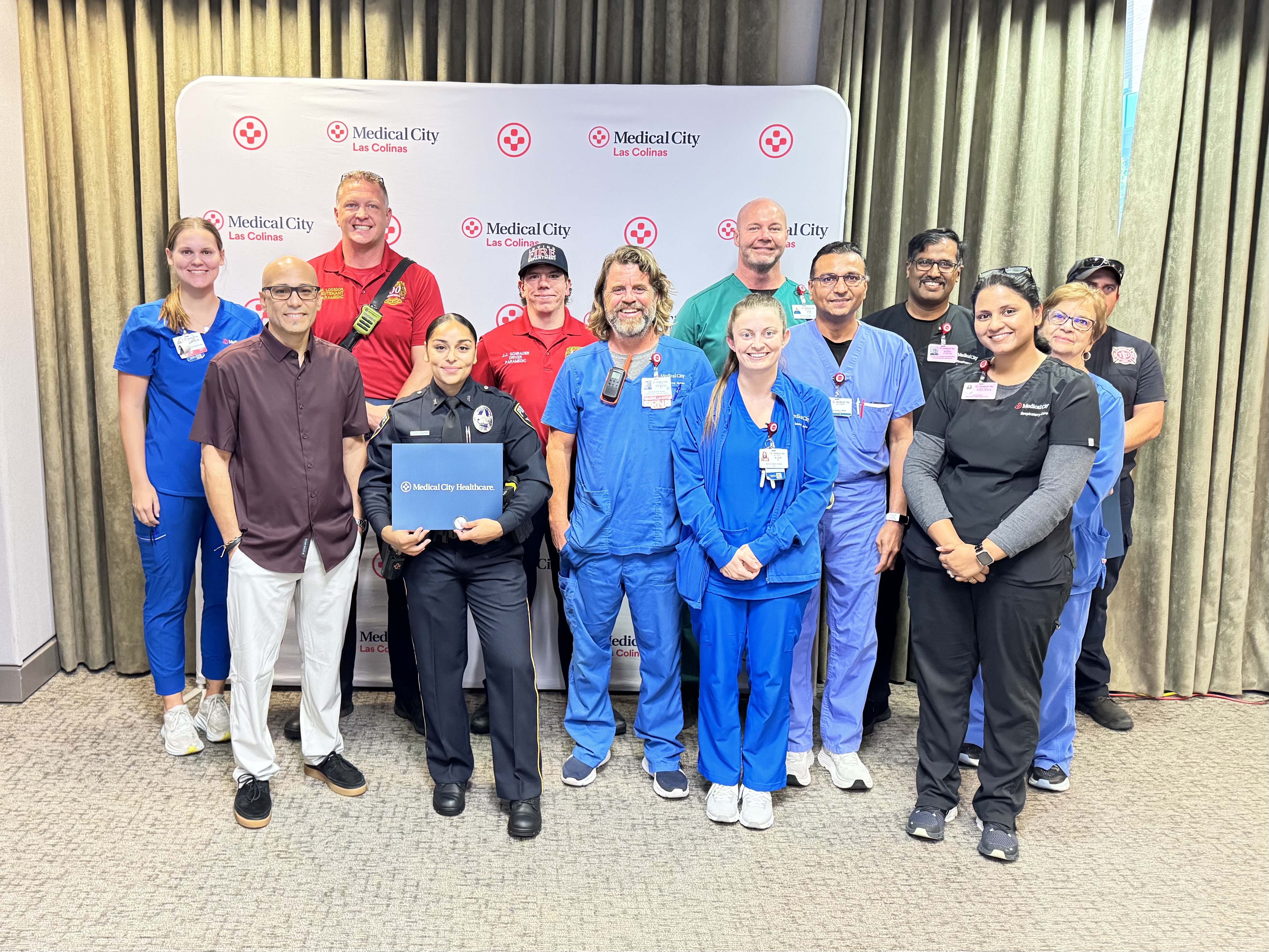 Patient with award honorees and Medical City Las Colinas staff