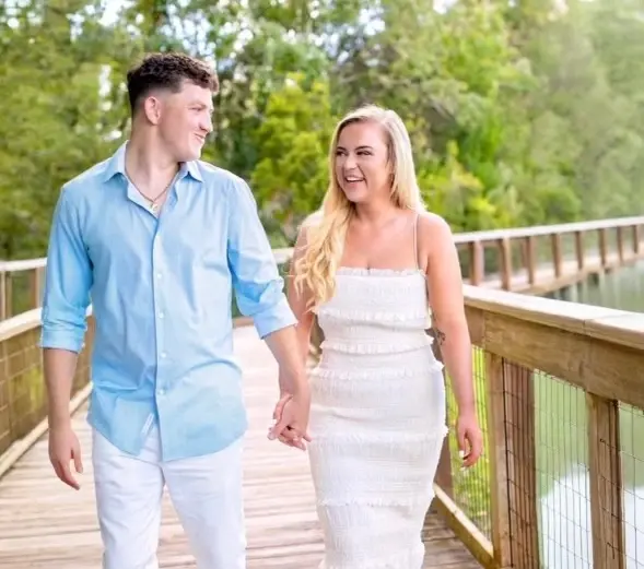 Danny Tucker and Marisa Thompson sharing engagement happiness ahead of April 2025 destination wedding