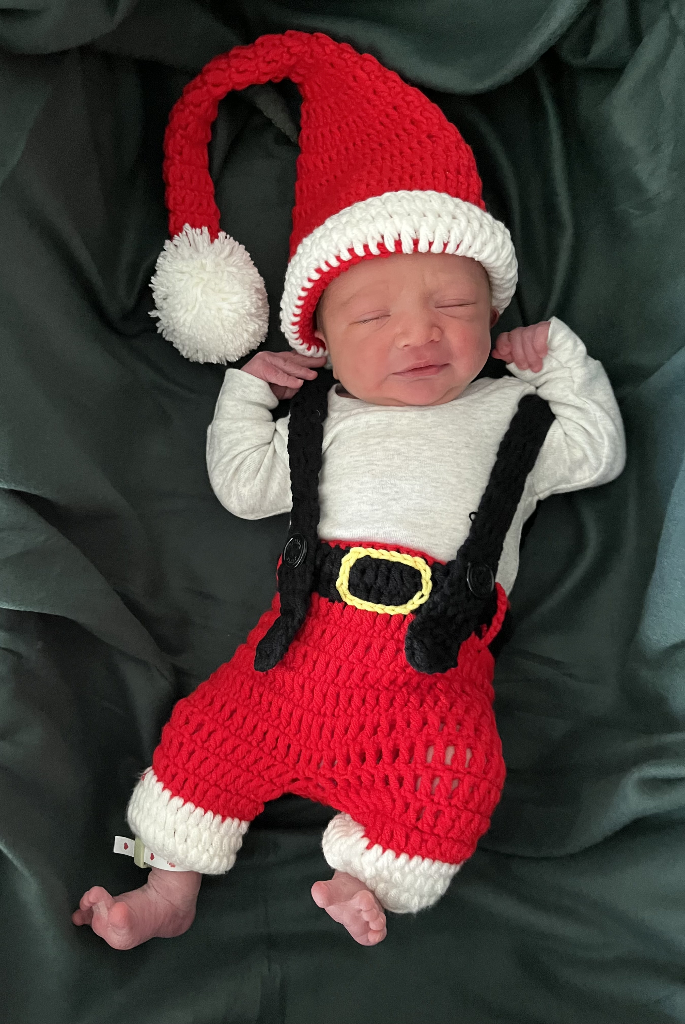 Christmas newborn dressed in festive attire
