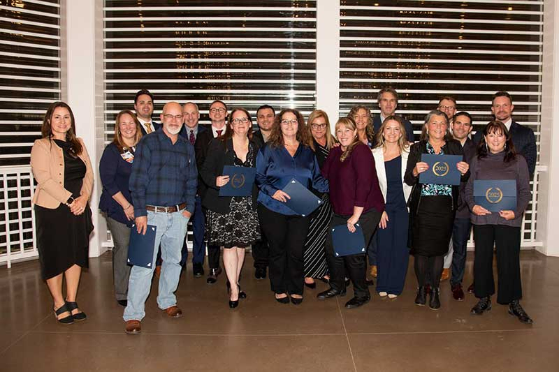Employees celebrate 25 Year anniversaries, pictured with the leadership teams of Portsmouth Regional Hospital and Frisbie Memorial Hospital.