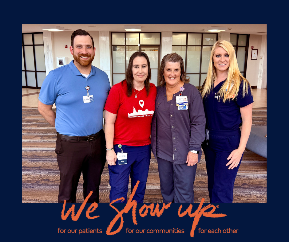 staff group photo of 4 with "we show up" slogan below photo, "for our patients, for our communities, for each other"
