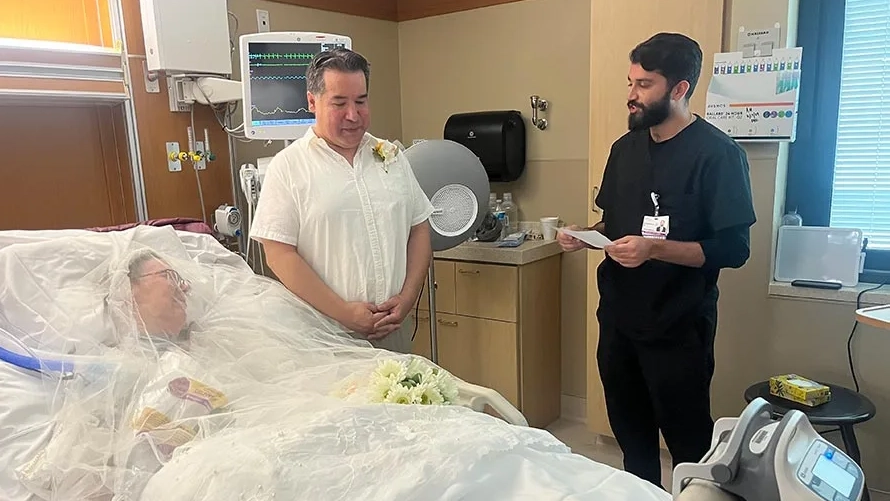 Lori, Eddie and Dr. Navroop Sekhon performing the ceremonial wedding in her hospital room.